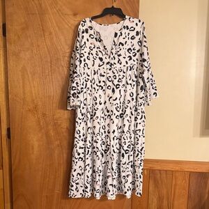 Elegant White and Black Leopard Print Dress